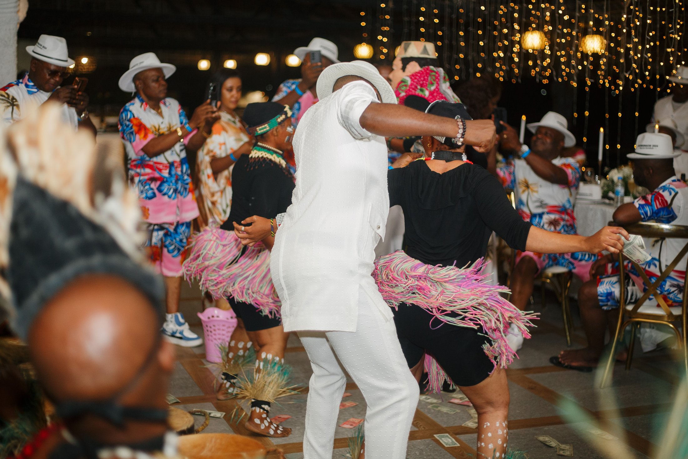 Guests dancing at an evening celebration
